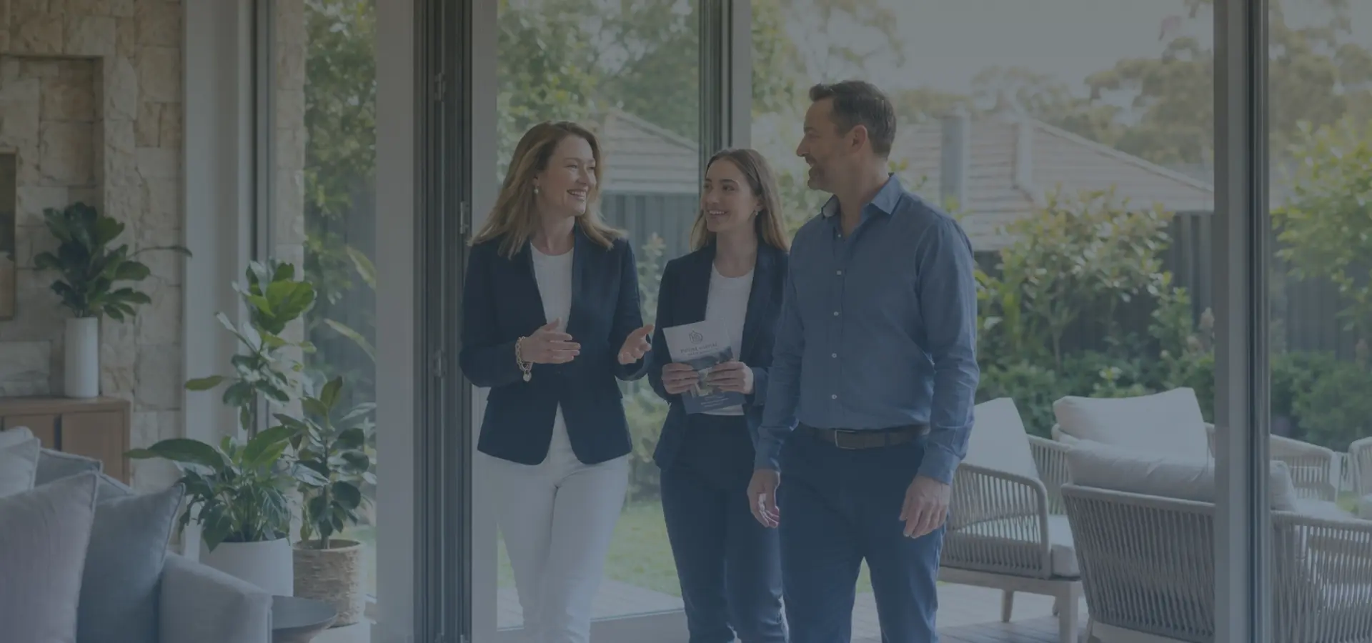 Susan Gerahty taking buyers through a home